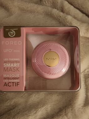 FOREO UFO Mini Smart Mask Device in Pink with Gold Accent